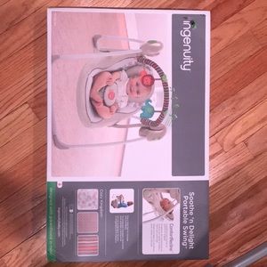 Brand new baby swing w/reclining positions